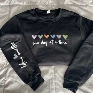 Black Sweatshirt with Heart Design